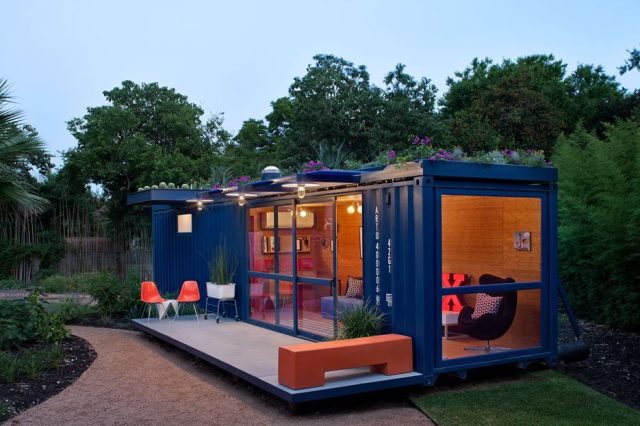 beatiful 40ft blue shipping container coverted to a guest house pictured at night